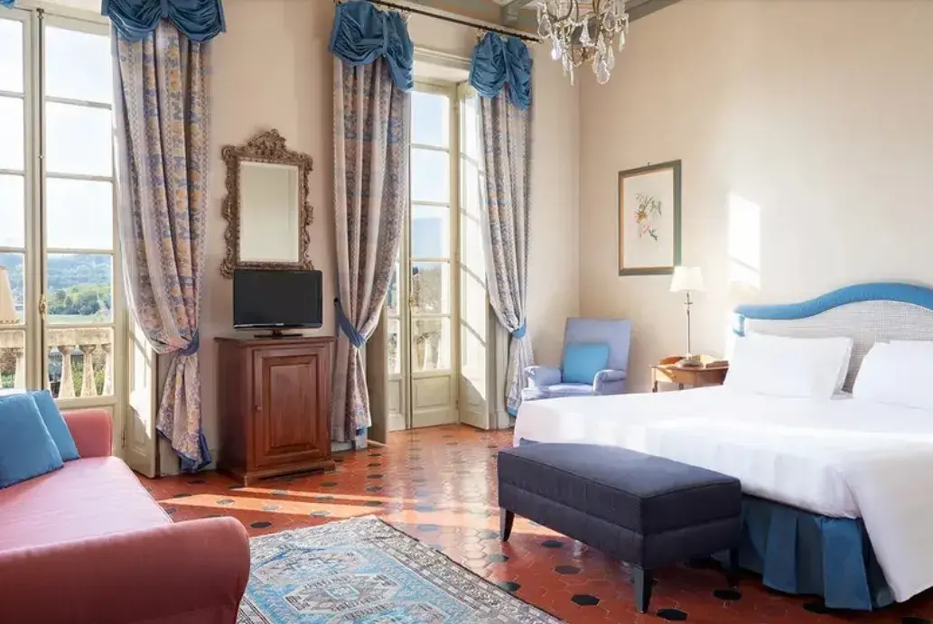 Authentic sleeping room in 18th century style in a luxury hotel in Piedmont Italy