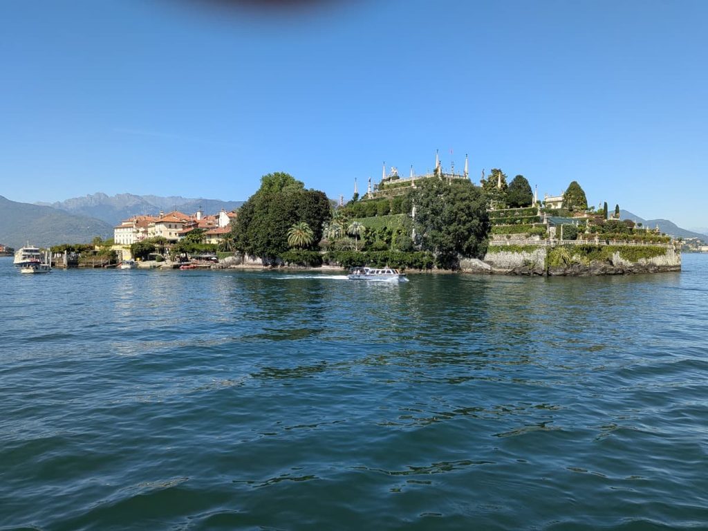 Isola Bella rises from Lake Maggiore with its grand Borromeo gardens, historic buildings and mountain backdrop, making it a standout stop on any Borromean Islands day trip.